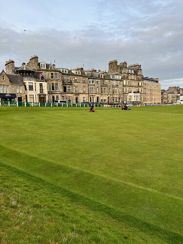 The 18th green getting it's morning shave.