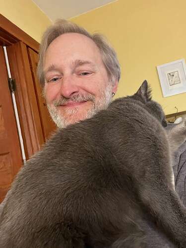 His new favorite spot when I'm on Zoom calls.