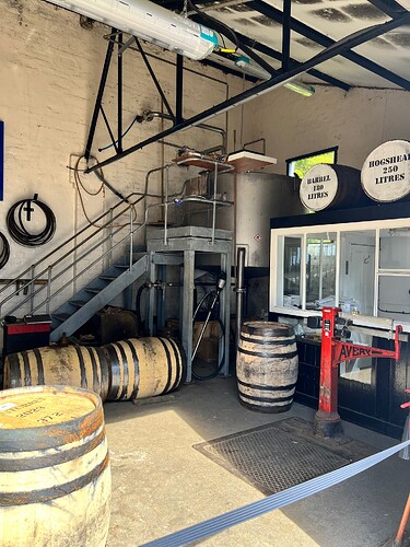 They cask it up over here. A pipe running from the distillery under the driveway feeds this. It's to avoid explosions.