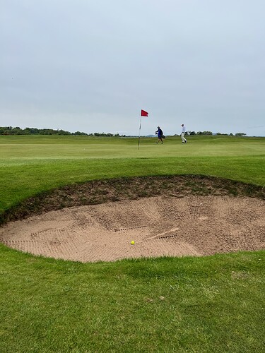 WTF? One last greenside bunker? On 18.