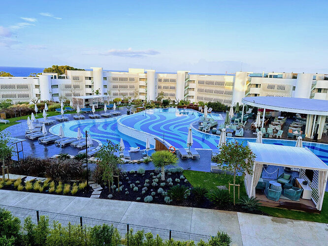 A view of the pools and outdoor bar area