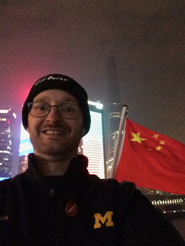 Me, the Chinese flag, the 2nd tallest building in the world. Go Blue!