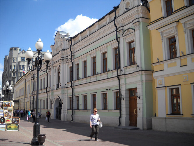 Loretta loved the contrast of black downspouts with the colorful buildings.