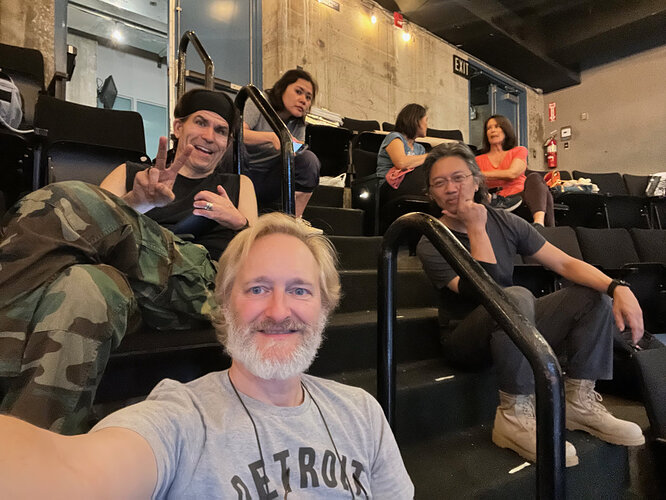 In the theatre awaiting notes