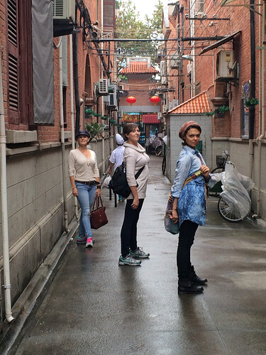 Three Sisters, posing in a hutong.