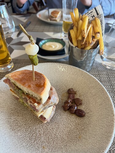 Half of my tuna sandwich in ‘bolo lêvedo’ with garlic & herbs butter