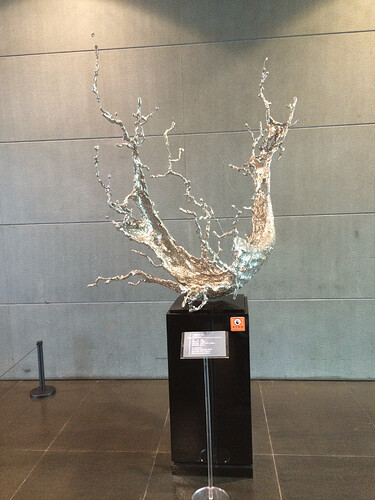 This is a sculpture of stainless steel. I didn't get the details but it’s incredibly small strands of metal that have been either woven or pounded together. It’s unbelievably intricate when you get up close.