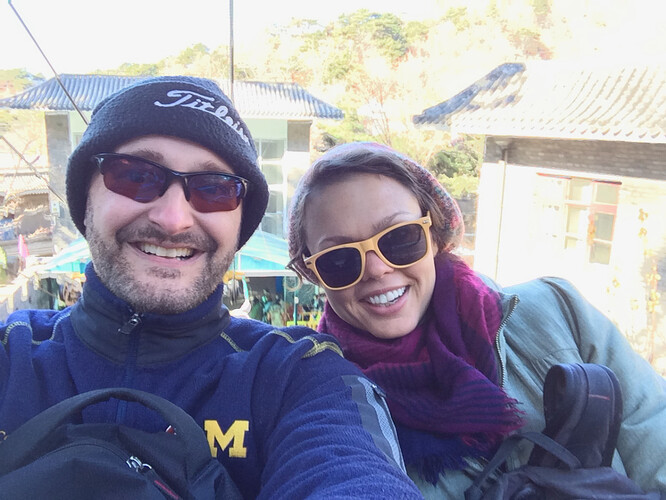 Heading up to a section of the wall on a cable car with Caitlyn…and I'm gripping my phone like I never have before