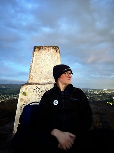 Taking a moment to reflect on the stupidity of having climbed up here.