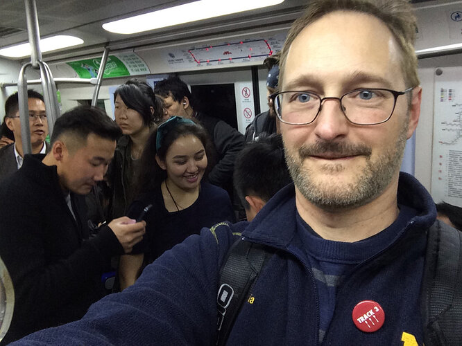 On the metro, taking pix of people who were grabbing pix of Jesse