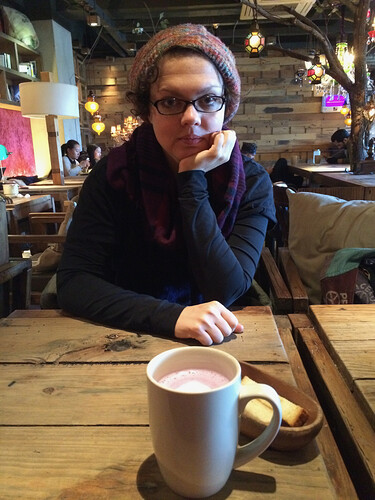 Caitlyn trying to hypnotize me into giving her my sweet potato latte.