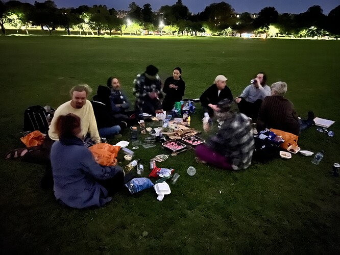 Later in the picnic, with flame jugglers in the background.